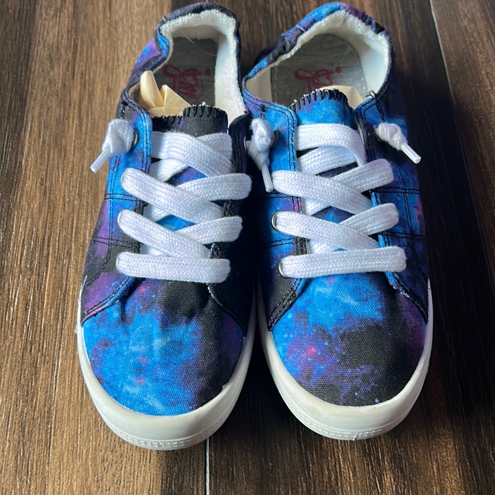 Galaxy women’s shoes! Very fun to wear. Size 6.5